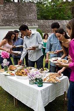 group_of_people_at_outdoor_potluck