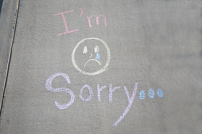 I'm Sorry written in chalk on sidewalk