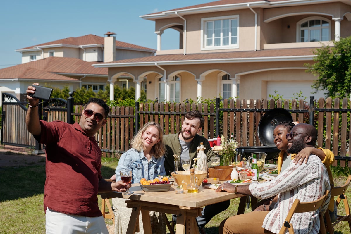 Happy neighbors outside taking a picture