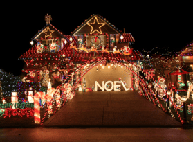 house lit up with Christmas lights