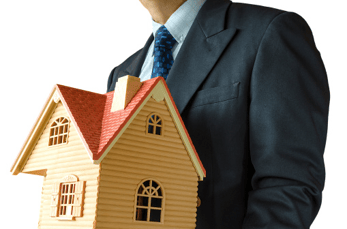 man holding house
