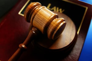Gavel on top of law book