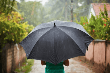 heavy rain and umbrella