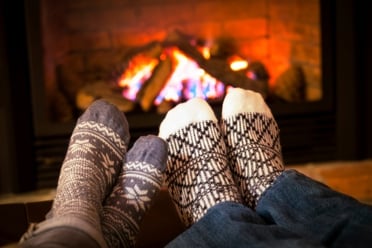 feet_warming_by_fireplace