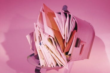 Junk_mail_overflowing_in_mailbox