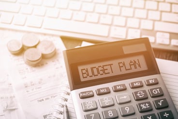 calculator with text budget plan shutterstock_556189834