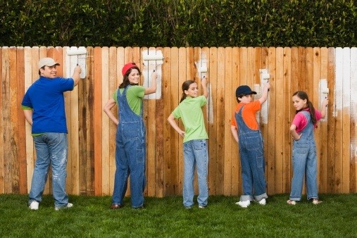 family_painting_fence