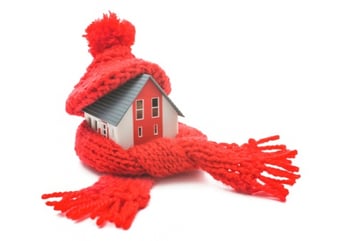 house wrapped in hat and scarf