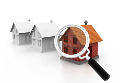 House under a magnifying glass