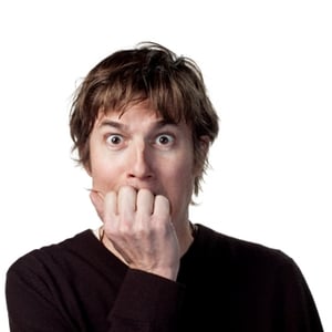 man biting nails