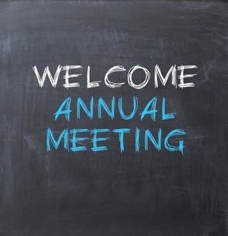 welcome annual meeting written on chalkboard