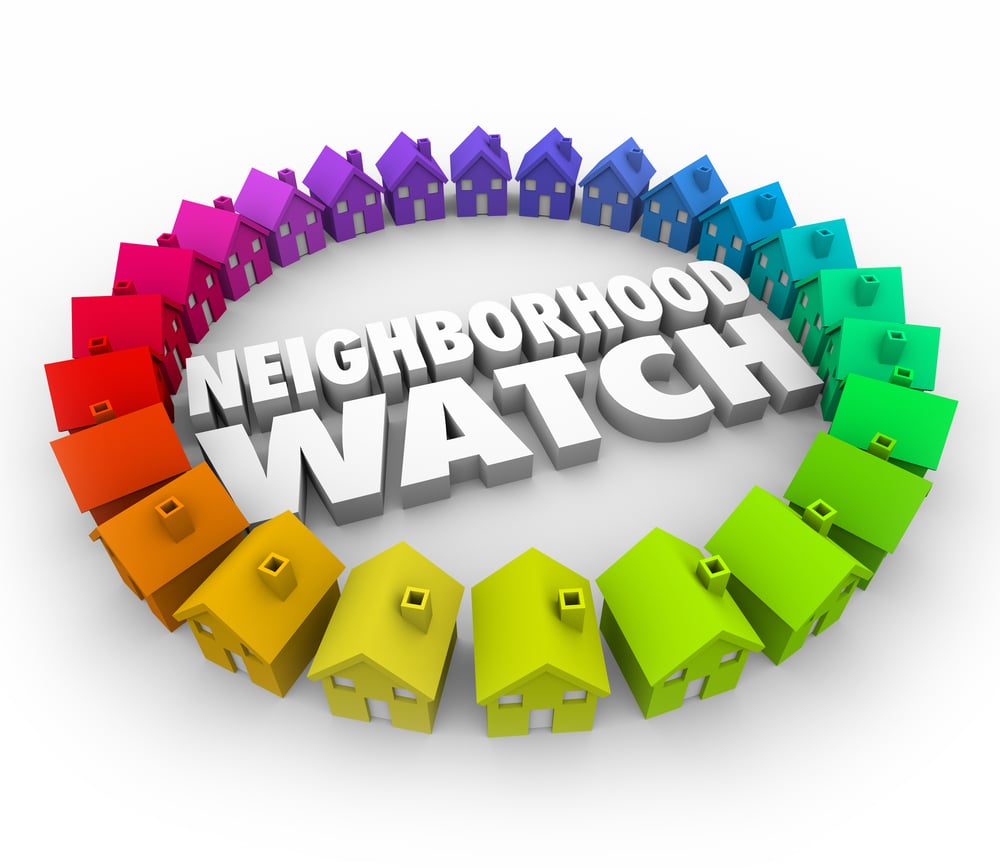 neighborhood watch words surrounded by colorful houses